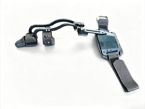 Black single mechanical prosthetic finger and Backplate laid flat