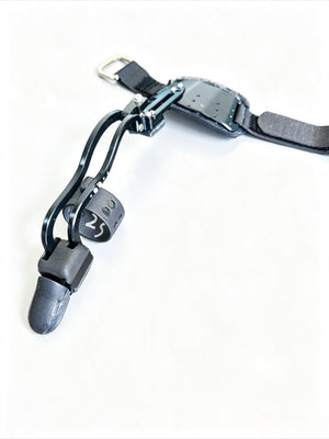 Black single mechanical prosthetic finger with Backplate, diagonal view