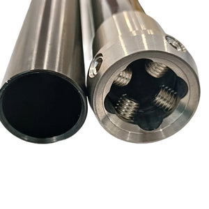 Two prosthetic pylon tube components showing the open connector end
