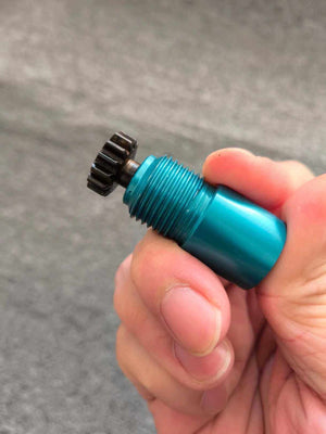 Side view of the reverse-thread lock core held between fingers