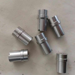 Several prosthetic lock core components shown from different angles