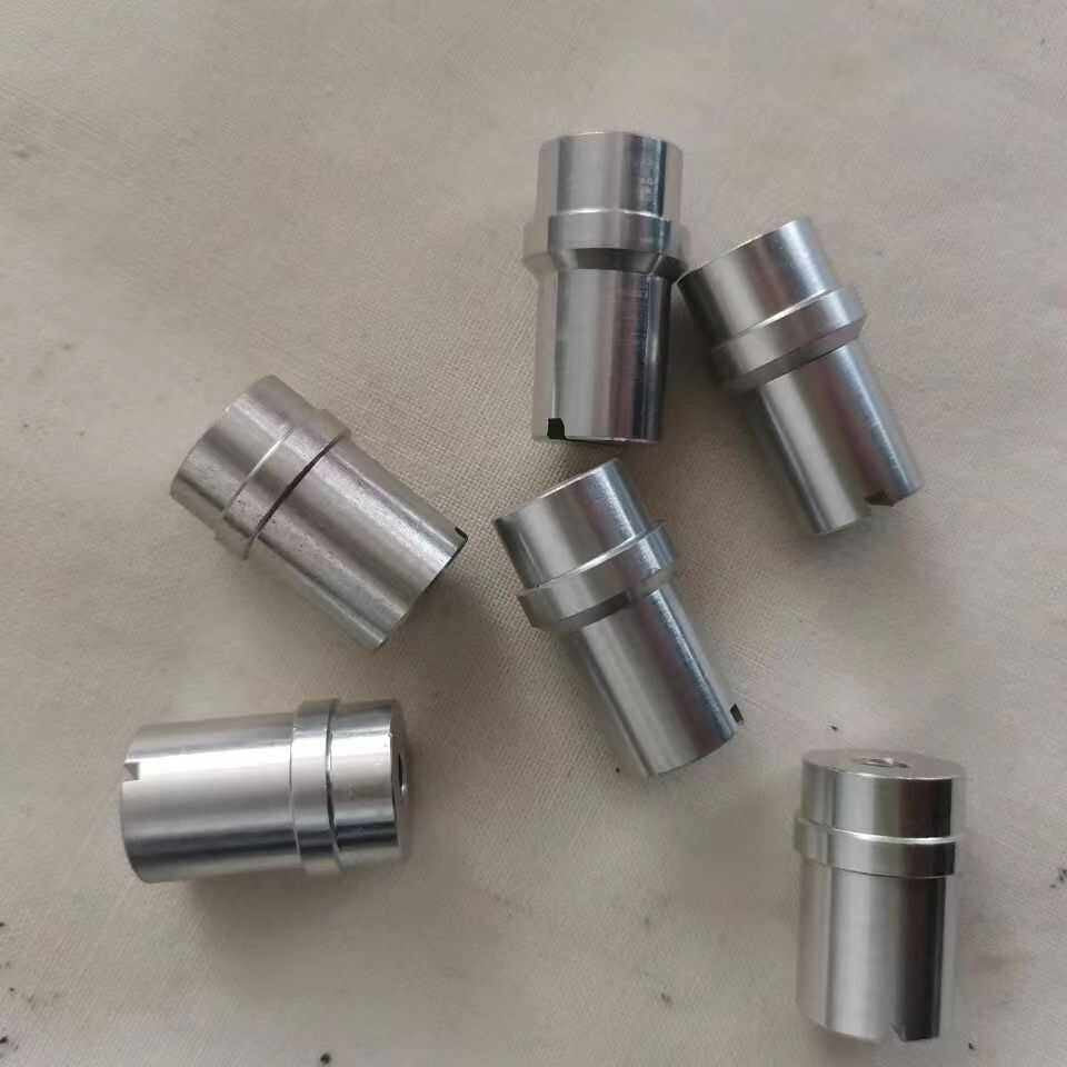 Several prosthetic lock core components shown from different angles