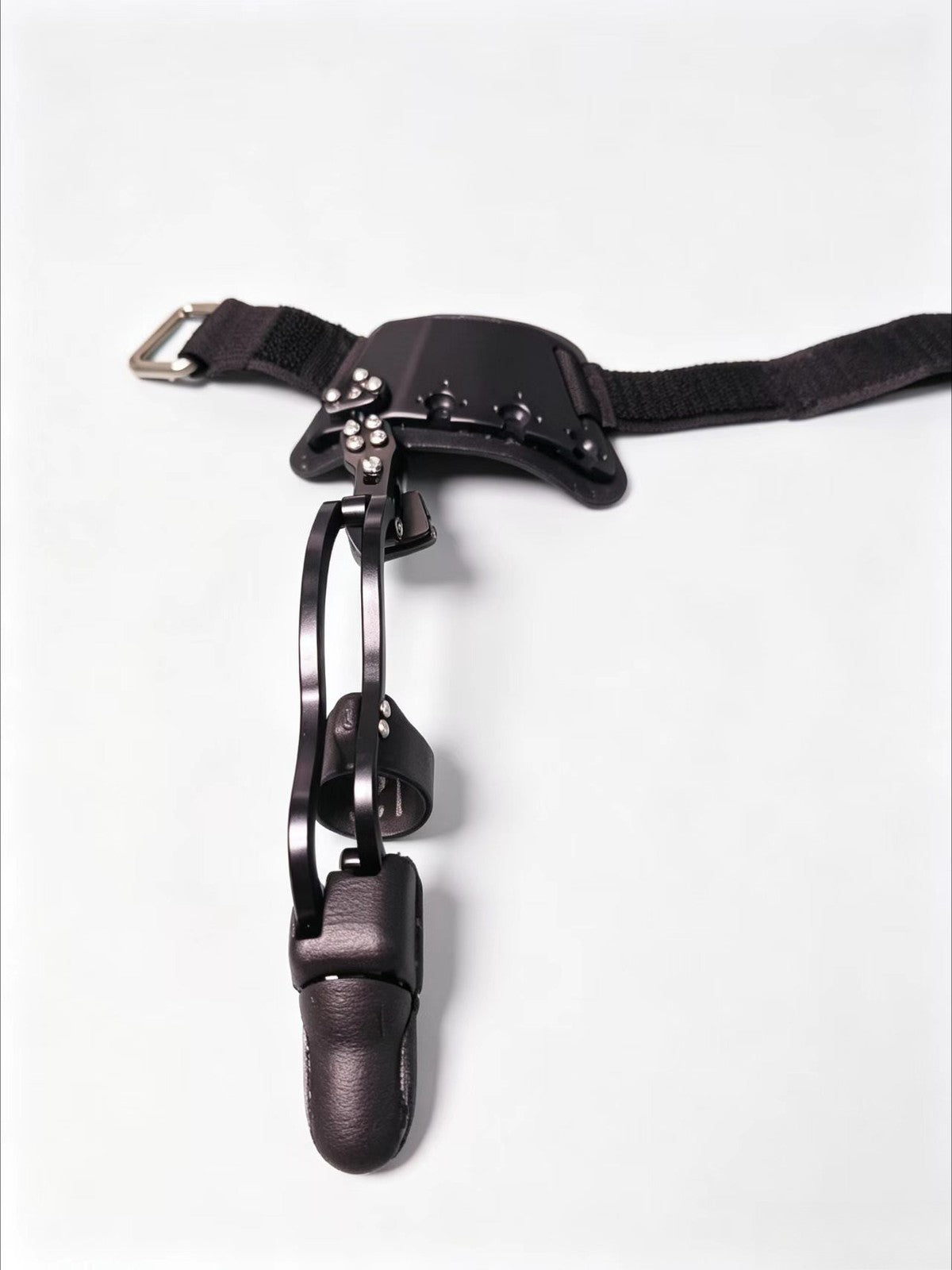 Black single mechanical prosthetic finger with Backplate, front view